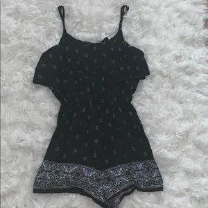 Black ruffled romper